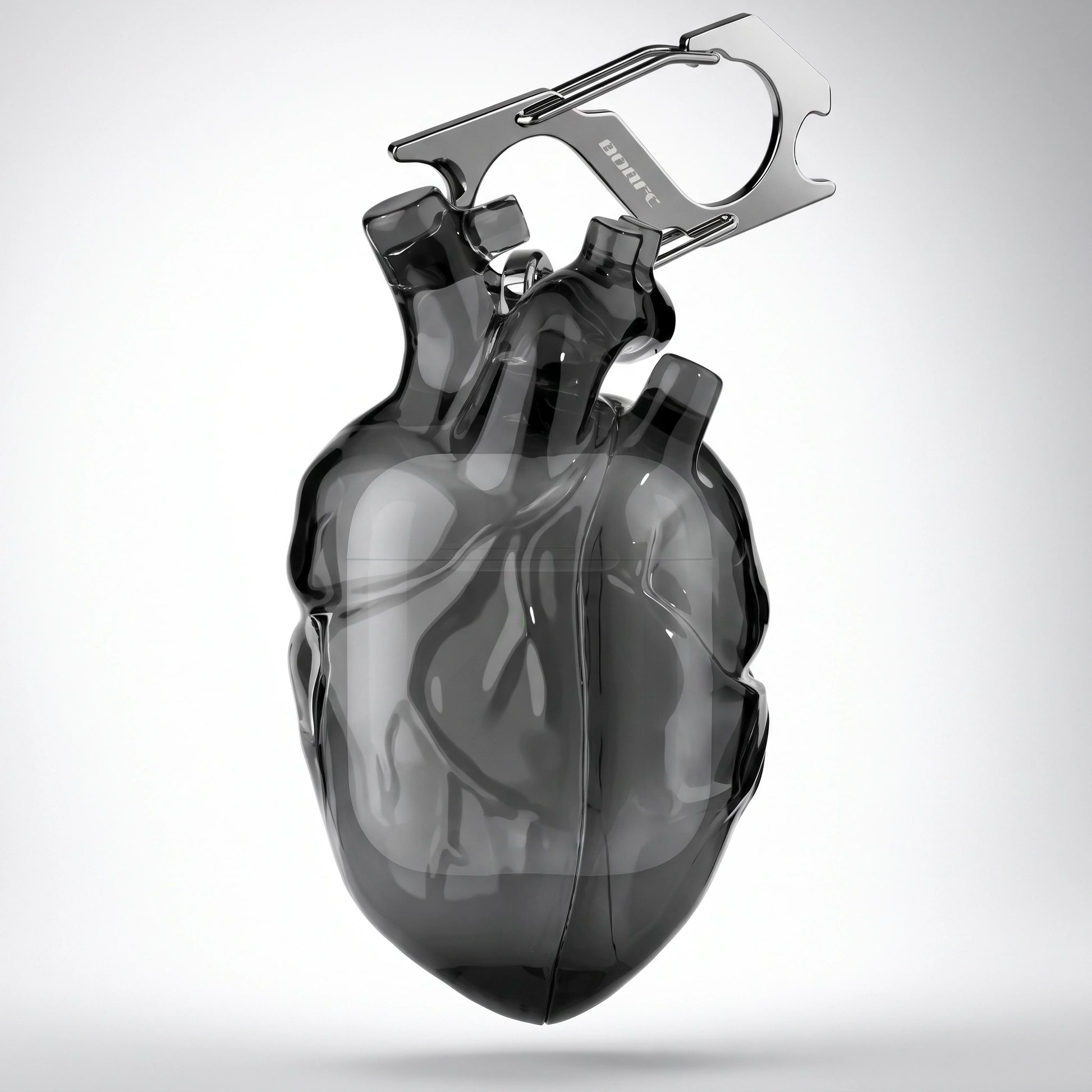 Black smoky anatomical heart AirPods case with its steel carabiner on white